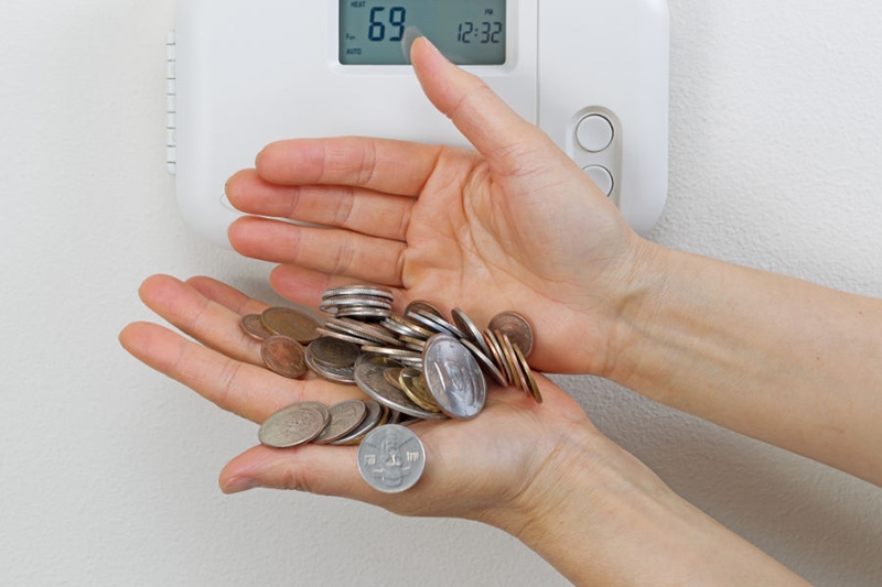 Homeowner starting to see summer savings with his air conditioning. Scott Brothers blog image.